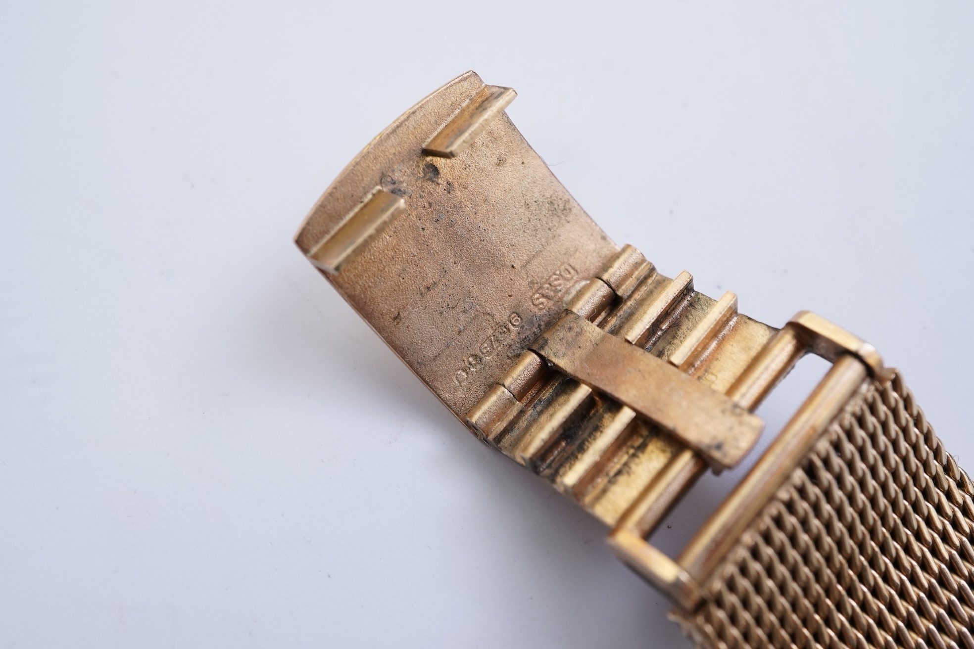A gentleman's late 1960's 18ct gold Omega Constellation Automatic Chronometer Officially Certified wrist watch, on an associated 9ct gold mesh link bracelet